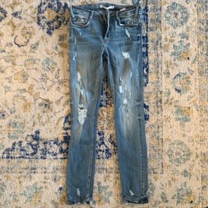 Light blue distressed jeans